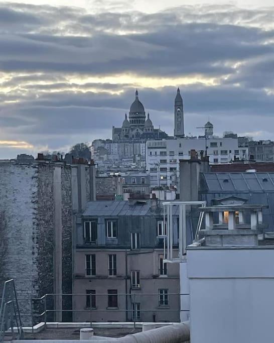 パリVue Sur Le Sacre Coeur Montmartreアパートメント エクステリア 写真